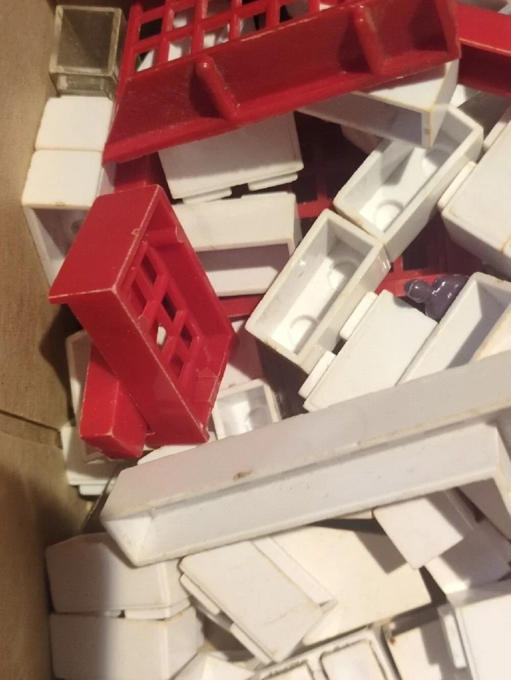 Assorted Kids Building Set Pieces in Red, White, Green, Orange